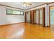 Bedroom featuring hardwood floors, a ceiling fan, large closets and natural light at 431 Keeler Woods Nw Dr, Marietta, GA 30064
