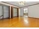 Spacious bedroom with hardwood floors, large closets, and an attached bathroom at 431 Keeler Woods Nw Dr, Marietta, GA 30064