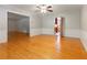 Spacious dining room with wood floors, classic wallpaper, and view to kitchen at 431 Keeler Woods Nw Dr, Marietta, GA 30064