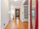 Inviting entryway with hardwood floors, closet doors and glass accented front door at 431 Keeler Woods Nw Dr, Marietta, GA 30064