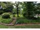 The front yard features mature landscaping at 431 Keeler Woods Nw Dr, Marietta, GA 30064