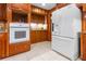 Kitchen features an LG refrigerator, tile floors, granite countertops, and recessed lighting at 431 Keeler Woods Nw Dr, Marietta, GA 30064