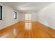 Bright living room with hardwood floors and double doors to outdoor space at 431 Keeler Woods Nw Dr, Marietta, GA 30064