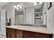 Bathroom featuring a double sink vanity, granite countertop, and a large mirror, creating a functional space at 792 Mimosa Se Dr, Marietta, GA 30060