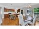 Open dining area features hardwood floors and is adjacent to a fully-equipped kitchen at 792 Mimosa Se Dr, Marietta, GA 30060