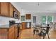 Charming kitchen with granite countertops, stainless steel appliances, and wooden cabinets at 792 Mimosa Se Dr, Marietta, GA 30060