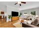 Bright living room features hardwood floors, neutral walls, and comfortable seating at 792 Mimosa Se Dr, Marietta, GA 30060