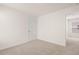 Empty room with carpeted floors and a closet for easy move in at 12086 Conrad Cir, Hampton, GA 30228