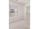Carpeted room with natural lighting and a closet is move in ready at 12086 Conrad Cir, Hampton, GA 30228