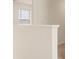 Brightly lit hallway featuring neutral walls and carpet at 12086 Conrad Cir, Hampton, GA 30228