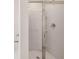 Modern shower equipped with sleek chrome hardware and glass door enclosure at 12086 Conrad Cir, Hampton, GA 30228