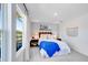 Bright bedroom with a view featuring soccer-themed decor and ample natural light at 1405 Windance Lake Dr, Loganville, GA 30052