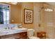 Bathroom vanity featuring marble countertops and modern shower at 1820 Peachtree Nw St # 811, Atlanta, GA 30309