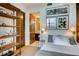 Bedroom with modern shelving and décor at 1820 Peachtree Nw St # 811, Atlanta, GA 30309