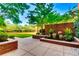 Tranquil courtyard featuring a fountain, lush greenery, and manicured landscaping, offering a serene outdoor space at 1820 Peachtree Nw St # 811, Atlanta, GA 30309