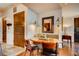 Charming dining area featuring modern lighting, comfortable seating, and hardwood floors at 1820 Peachtree Nw St # 811, Atlanta, GA 30309