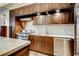Elegant kitchen with stainless steel appliances, granite countertops, and custom cabinetry at 1820 Peachtree Nw St # 811, Atlanta, GA 30309