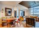 Open floorplan combines dining and living room with lots of natural light and city views at 1820 Peachtree Nw St # 811, Atlanta, GA 30309