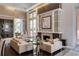 Inviting lounge area with a fireplace, comfortable seating, and elegant decor, perfect for relaxation at 1820 Peachtree Nw St # 811, Atlanta, GA 30309