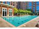 Refreshing outdoor pool surrounded by comfortable lounge chairs at 1820 Peachtree Nw St # 811, Atlanta, GA 30309