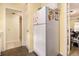 This kitchen features a white refrigerator, galley layout and linoleum flooring at 6433 Stone Terrace Ter, Morrow, GA 30260