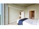 Comfortable bedroom featuring soft carpet, closet and access to an ensuite bathroom at 3300 Windy Ridge Se Pkwy # 1121, Atlanta, GA 30339
