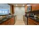 Well-equipped kitchen with granite countertops, stainless steel appliances, and modern cabinetry at 3300 Windy Ridge Se Pkwy # 1121, Atlanta, GA 30339