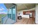 Bright living room featuring hardwood floors, floor-to-ceiling windows, and stainless steel appliances at 3300 Windy Ridge Se Pkwy # 1121, Atlanta, GA 30339