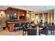 Modern lounge area with a stylish bar, dual flat-screen televisions, and comfortable seating arrangements at 3300 Windy Ridge Se Pkwy # 1121, Atlanta, GA 30339