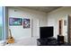 Bright home office with wall art, large window with a view, and neutral decor at 3300 Windy Ridge Se Pkwy # 1121, Atlanta, GA 30339