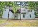 Exterior rear view of the home, showcasing the deck and backyard at 377 Tapley Rd, Villa Rica, GA 30180