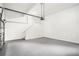 Spacious two car garage with stairs, new paint and door to the inside at 377 Tapley Rd, Villa Rica, GA 30180