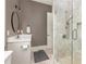 Modern bathroom with a glass-enclosed shower, sleek vanity, and contemporary fixtures at 385 Anders N, Chattahoochee Hills, GA 30268
