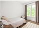 Bright bedroom featuring wood floors, natural light, and neutral decor to create a relaxing space at 385 Anders N, Chattahoochee Hills, GA 30268