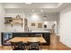 Kitchen featuring dark cabinets, an island for eating, and a great look that is spacious at 385 Anders N, Chattahoochee Hills, GA 30268