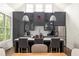 Modern kitchen showcasing gray cabinets, a functional island, and stainless-steel appliances at 385 Anders N, Chattahoochee Hills, GA 30268