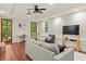 Living room has great natural light with access to a door and a great view outside at 385 Anders N, Chattahoochee Hills, GA 30268