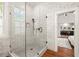 Glass shower with white brick style walls and opens to a bedroom at 385 Anders N, Chattahoochee Hills, GA 30268
