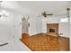 Cozy living room with brick fireplace, built-in shelving, and natural light at 8140 Wood St Se, Covington, GA 30014