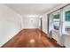 Spacious living room with hardwood floors, natural light, and classic trim at 8140 Wood St Se, Covington, GA 30014