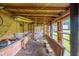 Rustic outbuilding interior with brick accents and windows, offering a unique space for storage or creative projects at 8140 Wood St Se, Covington, GA 30014