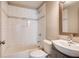 Well-lit bathroom featuring subway tile, built-in shelf and framed vanity mirror at 1450 Walker Se St, Smyrna, GA 30080