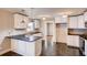 Bright kitchen with white cabinets, dark countertops, and stainless-steel appliances at 1450 Walker Se St, Smyrna, GA 30080