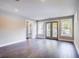 Bright living room showcasing access to a patio, natural light, and hardwood flooring at 1450 Walker Se St, Smyrna, GA 30080