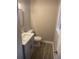 Bathroom with a modern vanity, updated fixtures, and wood-look flooring at 2058 Pair Sw Rd, Marietta, GA 30008