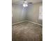 Neutral bedroom with carpet, a ceiling fan, and natural light from a window at 2058 Pair Sw Rd, Marietta, GA 30008
