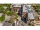 Aerial view showcasing the buildings layout, parking, landscaping and surrounding streets at 3235 Roswell Ne Rd # 508, Atlanta, GA 30305