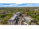 Aerial view shows the complex and the surrounding trees, skyline, and other buildings at 3235 Roswell Ne Rd # 508, Atlanta, GA 30305