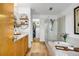Well-lit bathroom featuring soaking tub, shower with glass door, and direct access to closet at 3235 Roswell Ne Rd # 508, Atlanta, GA 30305