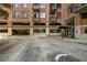 Attractive brick building entrance with covered parking and easy access for residents and visitors at 3235 Roswell Ne Rd # 508, Atlanta, GA 30305